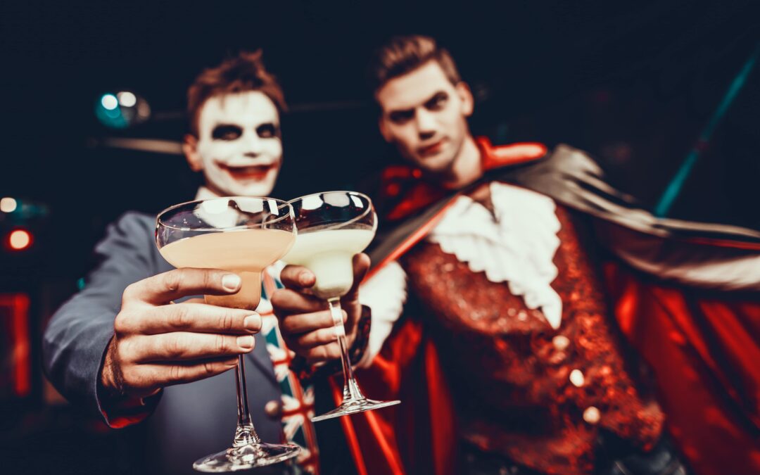 Friends with halloween cocktails from the best bar hire Colchester can offer