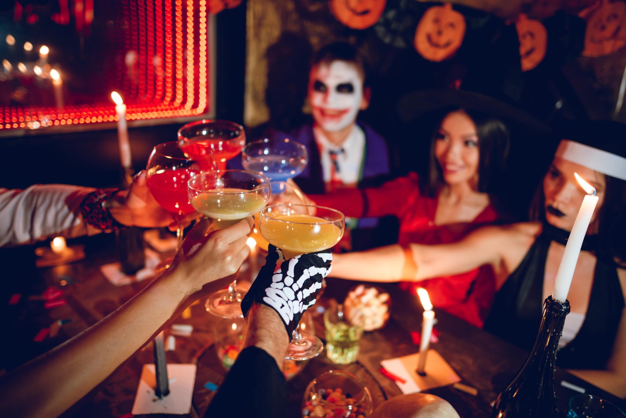 Friends with halloween gin cocktails from the best bar hire Colchester can offer