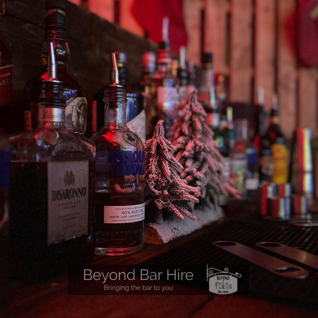 Beyond Bar Hire Bar Front with different spirits- Christmas Party Planning